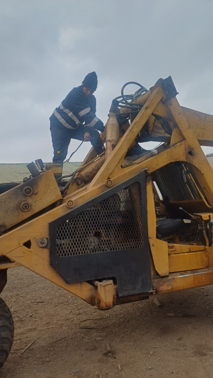 Backhoe loader harness and electrical repair in the field